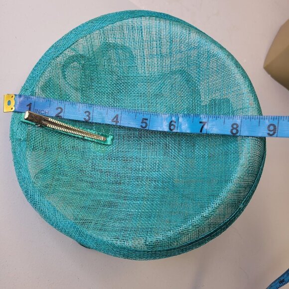 Teal Blue Fascinator with an Upturned Brim Sinamay Loops Rosettes and Feathers - Picture 7 of 16